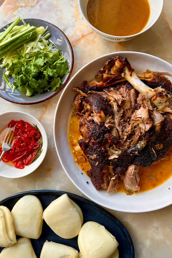 Sticky lamb bao with pickled chilli and coriander