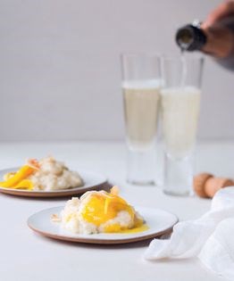 Sticky mango & lime rice pudding with toasted coconut