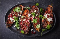 Sticky pomegranate & harissa aubergines