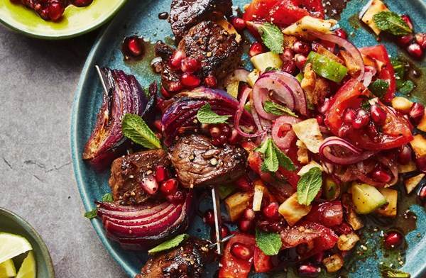 Sticky pomegranate lamb kebabs with pitta salad