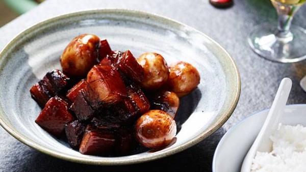 Sticky pork belly and chat potatoes