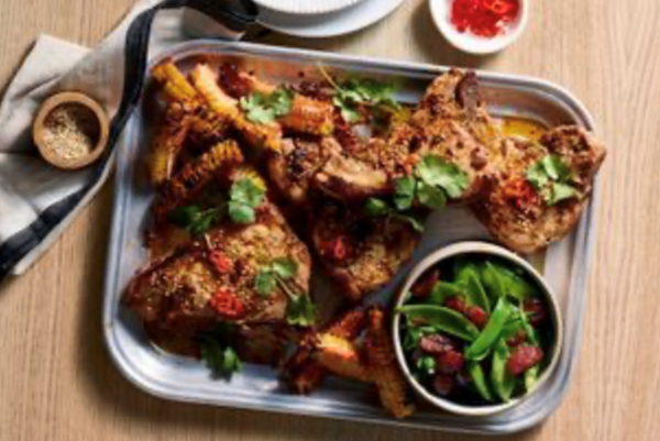 Sticky pork chops and corn ribs with lap cheong greens