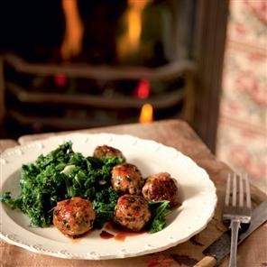Sticky pork meatballs with curly kale and garlic