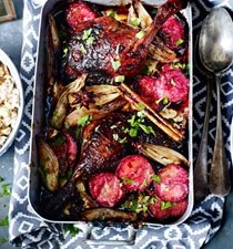 Sticky spiced duck legs with plums