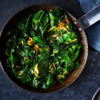 Stir-fried baby greens with mustard seeds, garlic and ginger