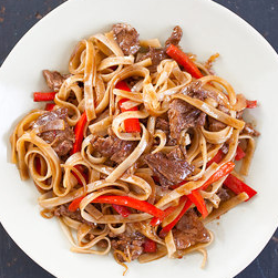 Stir-fried beef and rice noodles