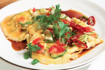 Stir-fried eggs and tomatoes with chilli soy sauce