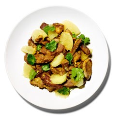Stir-fried grapefruit with lamb, curry, and cilantro