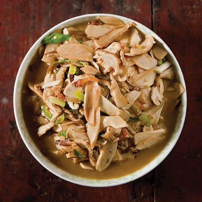 Stir-fried mushrooms with bacon, green chiles, and scallions (Xiaochao niugan jun)