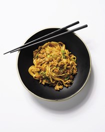 Stir-fried noodles with kimchi and pork