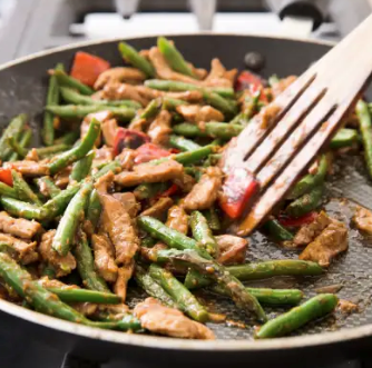 Stir-fried pork, green beans, and red bell pepper with gingery oyster sauce