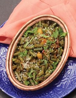 Stir-fried potatoes with green beans (Alu sem)