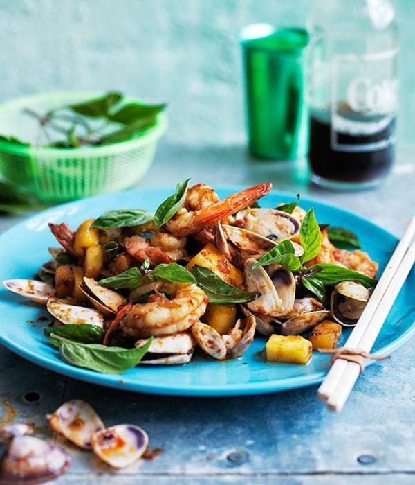 Stir-fried prawns and pipis in spicy sauce with pineapple