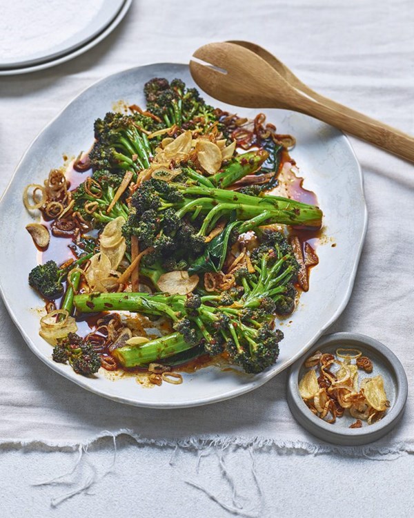 Stir-fried purple sprouting broccoli with crispy garlic and shallots