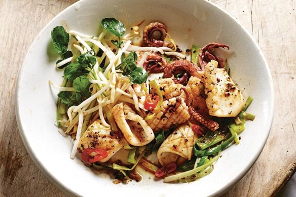 Stir-fried salt and pepper squid with red chilli and long green shallots