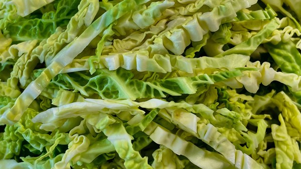 Stir-fried Savoy cabbage with fried peanuts & crispy lime leaves