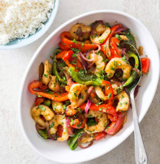 Stir-fried shrimp with onion, bell peppers, and cumin