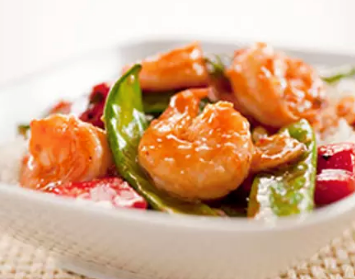 Stir-fried shrimp with snow peas and red bell pepper in hot-and-sour sauce