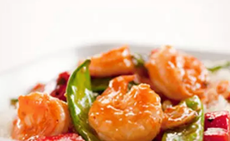 Stir-fried Sichuan-style shrimp with zucchini, red bell pepper, and peanuts