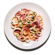 Stir-fried squid with garlic, parsley, and lemon