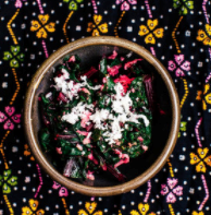 Stir-fried winter greens with black mustard seed & coconut