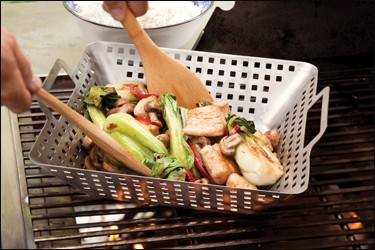 Stir-grilled chicken, mushrooms, and baby bok choy in oyster sauce