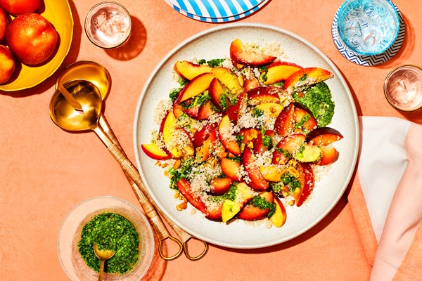 Stone fruit salad with collard-peanut pesto