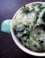 Stone-ground grits with spinach and Parmesan