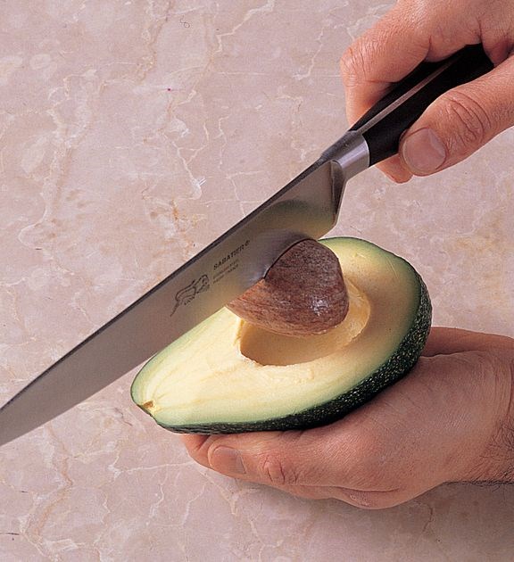 Stoning an avocado