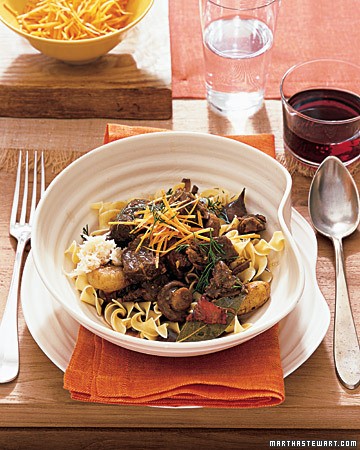 Stout and beef stew served over egg noodles