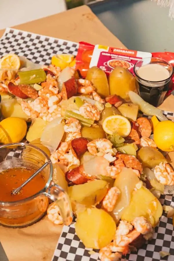 Stovetop Zatarain’s shrimp boil with Cajun style smoked sausage & garlic butter sauce