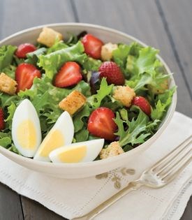 Strawberries & greens with ginger-scallion dressing