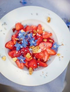 Strawberries and borage with flaked almonds