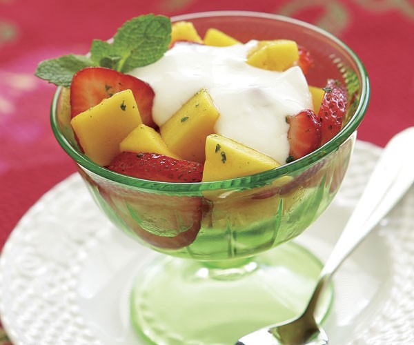 Strawberries and mangos with mint sugar