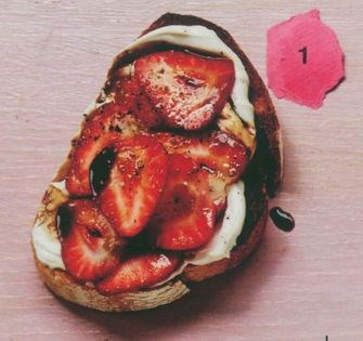 Strawberries, balsamic vinegar, black pepper on toast