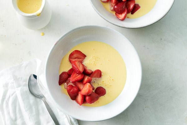 Strawberries in rose crème Anglaise