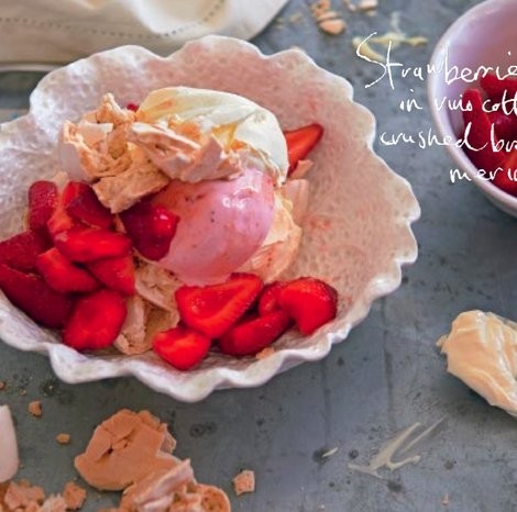 Strawberries in vino cotto with crushed brown-sugar meringues