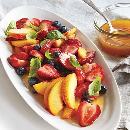 Strawberries, peaches, and basil with orange vinaigrette