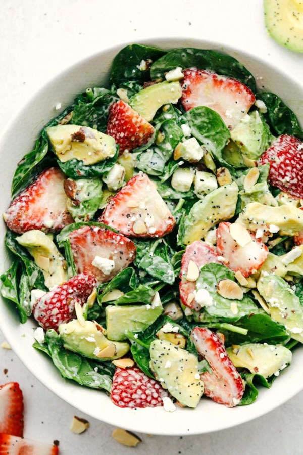 Strawberry avocado spinach salad with creamy poppy seed dressing