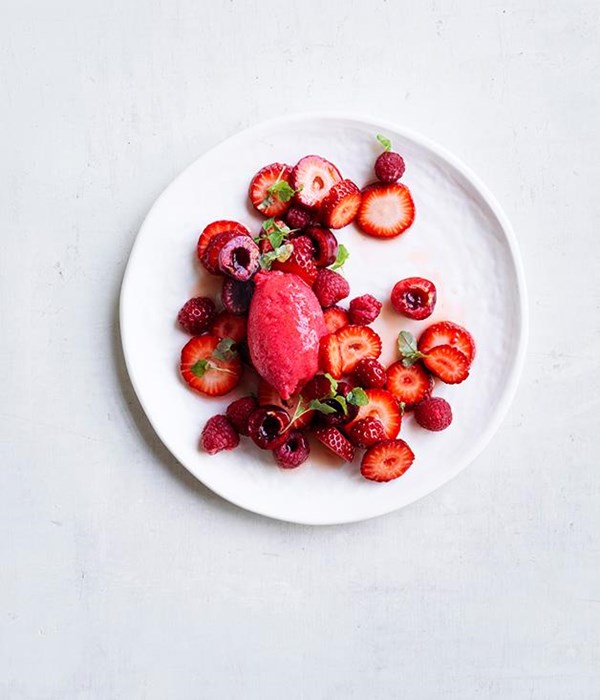 Strawberry, cherry and raspberry salad with raspberry sorbet