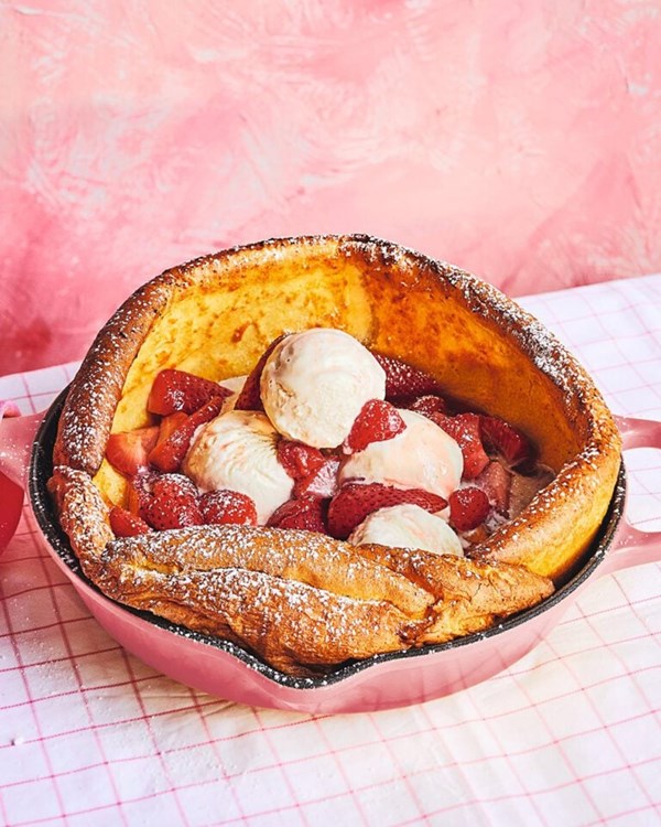 Strawberry Dutch baby with strawberry-top syrup