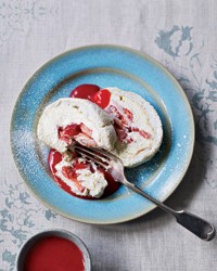 Strawberry meringue roulade with raspberry sauce