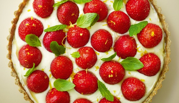 Strawberry open tart with lemon & vanilla 'cream' served with basil & mint