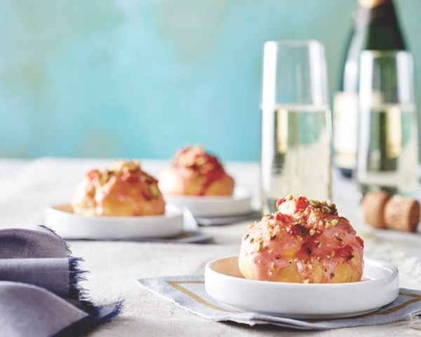 Strawberry, pistachio, and rose profiteroles