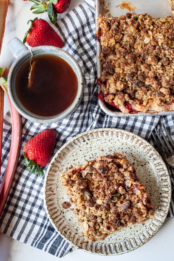 Strawberry rhubarb slab pie with pistachio crumb topping