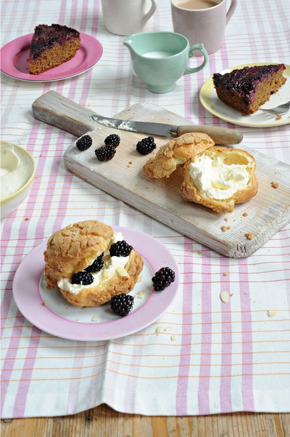 Streusel-topped choux buns with blackberries and lemon cream