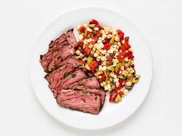 Strip steaks with corn salad 