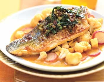 Striped bass with saffron vegetables and spiced broccoli rabe