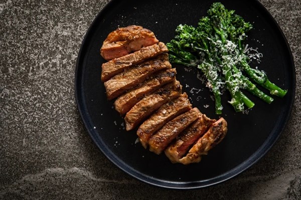 Striploin steak with Caesar-dressed tenderstem broccoli
