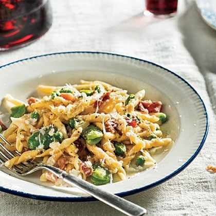 Strozzapreti with favas, peas, and prosciutto